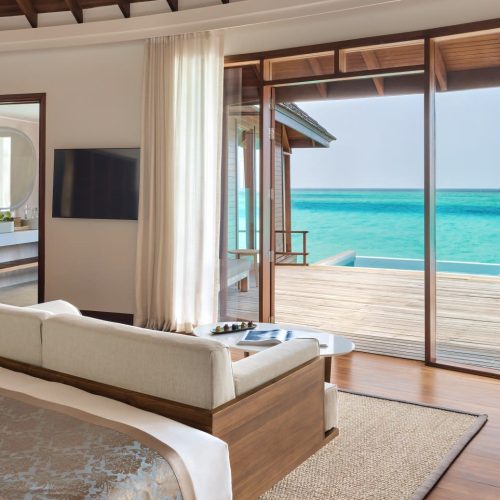 18-anantaradhigumaldivesresortguestroomoverwaterpoolsuitebedroomwithdeck1920x1037