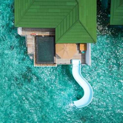 lagoon-villa-with-pool-slide-pool-aerial-view