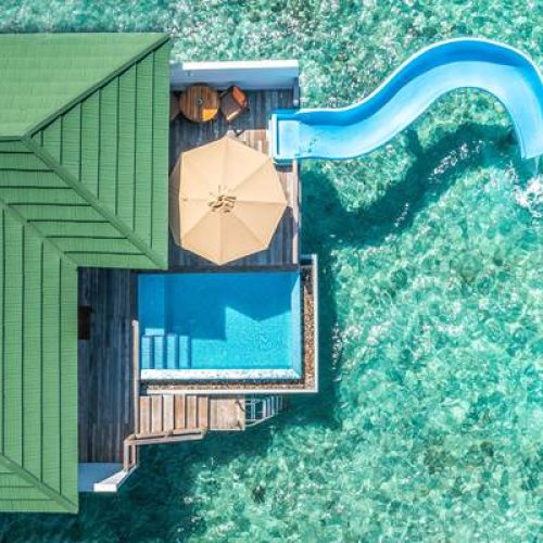 ocean-villa-with-pool-and-slide-aerial-1